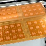 Future AI chips could be built on glass