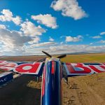 Red Bull Pilot Successfully Lands and Takes Off from Moving Train in Single Session