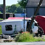 Train crashes into school minibus in Belgium, with unconfirmed reports of fatalities