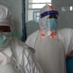 U.S. tightens Ebola travel restrictions as new cases emerge abroad