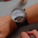 One Moving Needle Holds the Hours, Days, and Seconds on This Digital Watch with No Screen