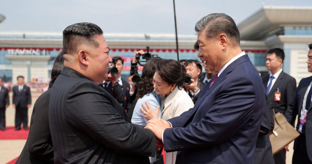 xi-jinping-kim-jong-un.jpg