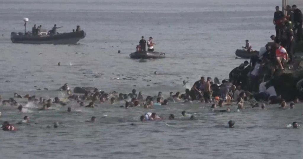 cbsn-fusion-thousands-of-migrants-cross-into-spains-tiny-ceuta-territory-some-die-in-journey-thumbna.jpeg