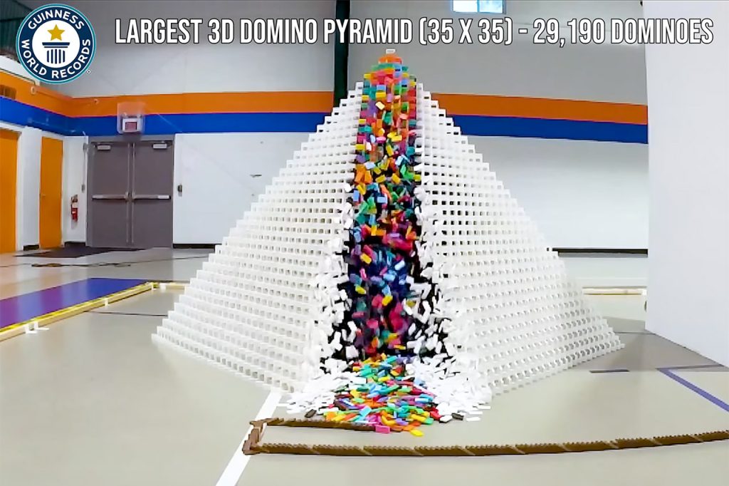 guinness-world-record-most-dominoes-toppled-in-3d-pyramid.jpg