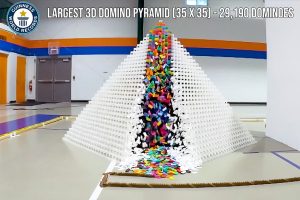 guinness-world-record-most-dominoes-toppled-in-3d-pyramid.jpg